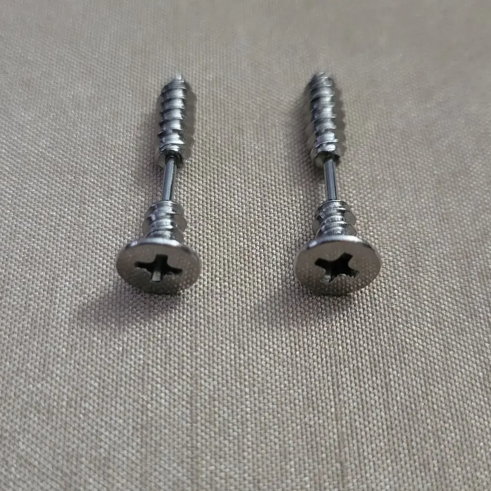 Silver screw shaped illusion post earrings